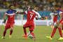 Zľava: Kyle Beckerman (Č.15, USA), DaMarcus Beasley (č.7), Kevin-Prince Boateng (Ghana) a John Brooks (č.6)  v zápase G-skupiny MS 2014 Ghana - USA (1:2). Natal, 16. jún 2014.