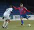 Sprava: Jan Kalabiška z FK Senica a Petr Kaspřák z FC Nitra v zápase 22. kola futbalovej Corgoň ligy medzi FK Senica a FC Nitra (2:1). 15. marec 2013, Senica.