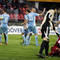 Róbert Vittek zo Slovana (uprostred)  a Dionatan Teixeira (vpravo dole) počas 9. kola Corgoň ligy medzi FK Dukla Banská Bystrica - ŠK Slovan Bratislava 2:4. Banská Bystrica, 14. september 2013.