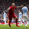 Martin Škrtel (Liverpool) sa raduje zo svojho gólu v zápase anglickej Premier League medzi FC Liverpool a Manchester City 3:2. Liverpool, 13. apríl 2014