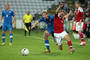 Lukáš Pauschek (vľavo) a Tomáš Hubočan, ktorý vybojoval loptu od dánskeho hráča. Odense, 15. augusta 2012.