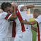 Tomáš Malec (uprostred) z AS Trenčín sa raduje z gólu počas 3. kola Corgoň ligy v zápase medzi AS Trenčín a ŠK Slovan Bratislava. Trenčín, 28. júl 2013.