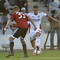 Trnavčan Ľuboš Hanzel (vľavo) a Trenčan Dávid Guba v zápase 8. kola Fortuna ligy AS Trenčín - Spartak Trnava (5:3). Trenčín, 13. septembra 2015.