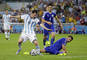 Argentínsky útočník Lionel Messi (vľavo), Emir Spahič (č.4 Bosna a Hercegovina) a Sead Kolašinac (na zemi, Bosna a Hercegovina) počas zápasu skupiny F Argentína - Bosna Hercegovina (2:1) na štadióne Maracaná v Rio de Janeiro. Rio de Janeiro, 15. jún 2014.