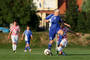 Alexandra Tóthová prechádza cez Anitu Straka v zápase ženských reprezentácií do 19 rokov Slovensko - Chorvátsko. Viničné, 21. august 2013.