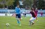 Hráč FC Nitra Róbert Valenta (vľavo) v súboji s brankárom Zvolena Patrikom Gábrišom v zápase 3. kola nadstavbovej časti DOXXbet ligy 2014/15 FC Nitra - MFK Lokomotíva Zvolen (1:1). Nitra, 18. apríla 2015.