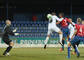 Martin Chudý a Petr Kašpřák, obaja z FC Nitra, Rolando Blackburn a Petr Pavlík, obaja z FK Senica, v zápase 22. kola futbalovej Corgoň ligy medzi FK Senica a FC Nitra (2:1). 15. marec 2013, Senica.