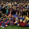 Tím FC Barcelona s trofejou Ligy majstrov, ktorú si v sezóne 2010/2011 vybojoval vo finále víťazstvom nad Manchesterom United 3:1. Londýn, 28. mája 2011.