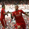 Luis Suárez a Martin Škrtel sa tešia z gólu slovenského reprezentanta v službách FC Liverpool do siete Boltonu v zápase Premier League na štadióne Anfield v Liverpoole. Liverpool, 27. augusta 2011.