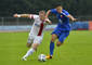 Zľava: obranca Peter Čögley (Trenčín) a stredopoliar Nemanja Radoja (Vojvodina) v zápase 2. predkola futbalovej Európskej ligy 2014/2015 AS Trenčín - Vojvodina Novi Sad  (4:0). Dubnica nad Váhom, 17. júla 2014.