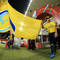 ABU DHABI, UNITED ARAB EMIRATES - OCTOBER 28:  The FIFA flags are carried to the pitch during the FIFA U-17 World Cup UAE 2013 Round of 16 match between Brazil and Russia at the Mohamed Bin Zayed Stadium on October 28, 2013 in Abu Dhabi, United Arab Emirates.  (Photo by Richard Heathcote - FIFA/FIFA via Getty Images)