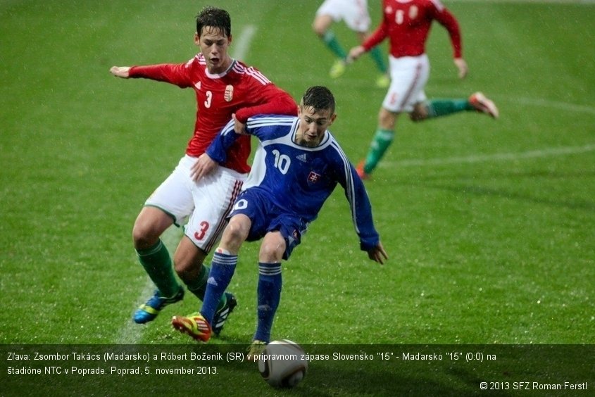 Zľava: Zsombor Takács (Maďarsko) a Róbert Boženík (SR) v prípravnom zápase Slovensko "15" - Maďarsko "15" (0:0) na štadióne NTC v Poprade. Poprad, 5. november 2013.