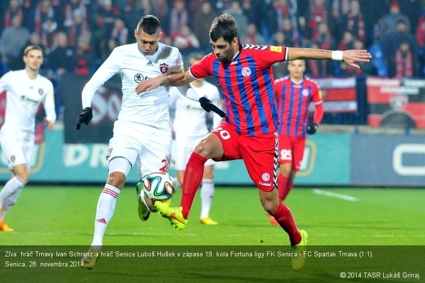 Zľva: hráč Trnavy Ivan Schranz a hráč Senice Luboš Hušek v zápase 19. kola Fortuna ligy FK Senica - FC Spartak Trnava (1:1). Senica, 28. novembra 2014.