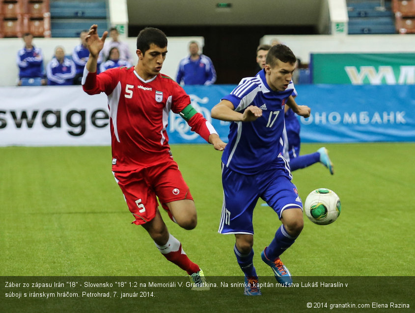 Záber zo zápasu Irán "18" - Slovensko "18" 1:2 na Memoriáli V. Granatkina. Na snímke kapitán mužstva Lukáš Haraslín v súboji s iránskym hráčom. Petrohrad, 7. január 2014.