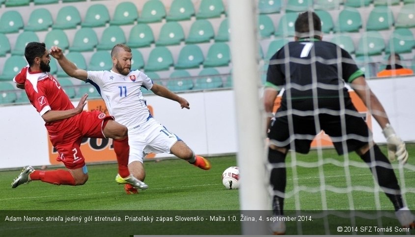 Adam Nemec strieľa jediný gól stretnutia. Priateľský zápas Slovensko - Malta 1:0. Žilina, 4. september 2014.