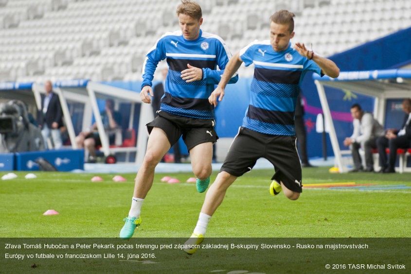 Zľava Tomáš Hubočan a Peter Pekarík počas tréningu pred zápasom základnej B-skupiny Slovensko - Rusko na majstrovstvách Európy vo futbale vo francúzskom Lille 14. júna 2016.