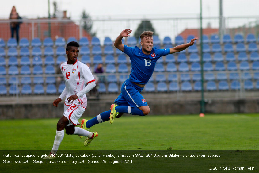 Autor rozhodujúceho gólu SR "20" Matej Jakúbek (č.13) v súboji s hráčom SAE "20" Badrom Bilalom v priateľskom zápase Slovensko U20 - Spojené arabské emiráty U20. Senec, 26. augusta 2014.