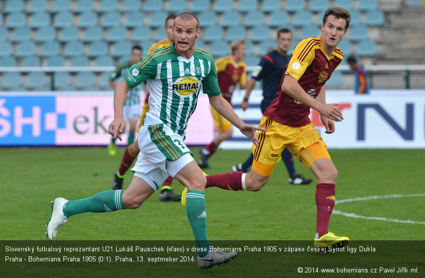 Slovenský futbalový reprezentant U21 Lukáš Pauschek (vľavo) v drese Bohemians Praha 1905 v zápase českej Synot ligy Dukla Praha - Bohemians Praha 1905 (0:1). Praha, 13. septmeber 2014.